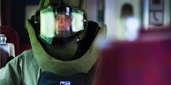An explosive ordnance disposal expert wearing a bomb suit